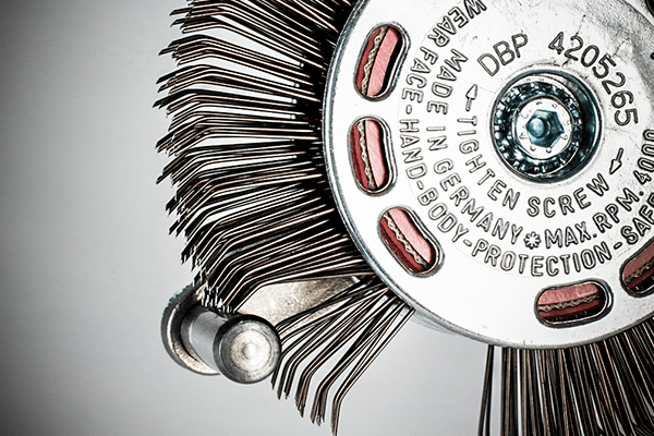 The bristle tips are designed to strike the corroded surface with kinetic energy that is equivalent to standard processes that use grit blast media.